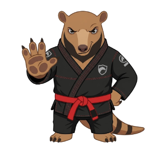 Mascote do Tamandujiu, um tamanduá de kimono, acenando